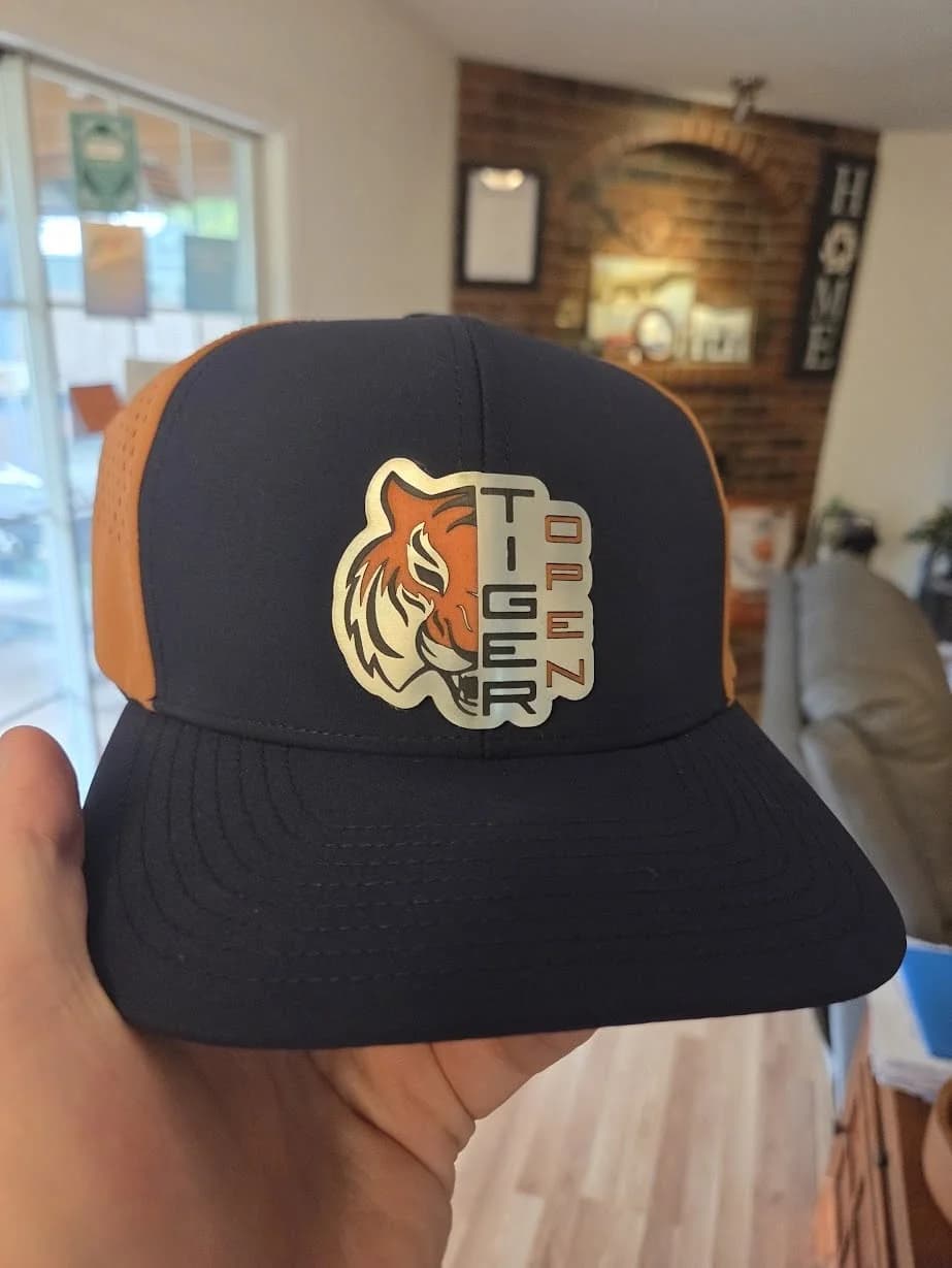 Custom acrylic patch cap created by Inca Threads for a Sacramento-area auto garage customer.