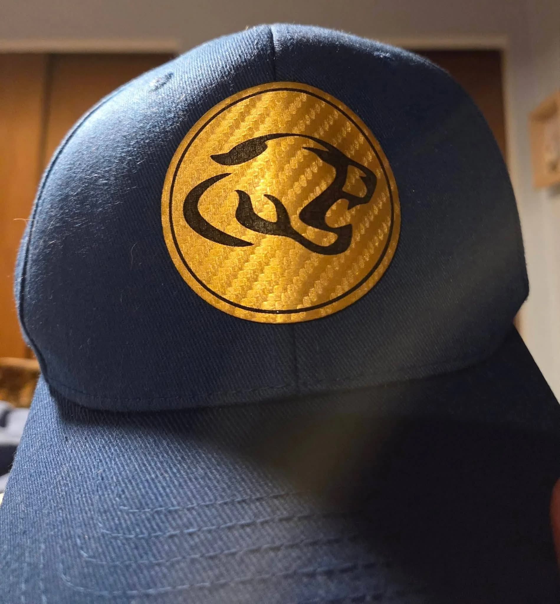 Close-up of a debossed leather patch on a custom cap, crafted by Inca Threads in Sacramento, California.