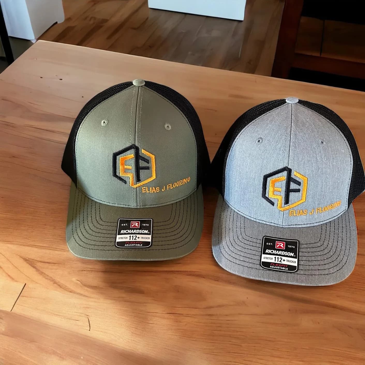 Embroidered construction company cap with custom logo, made by Inca Threads in Sacramento, California.