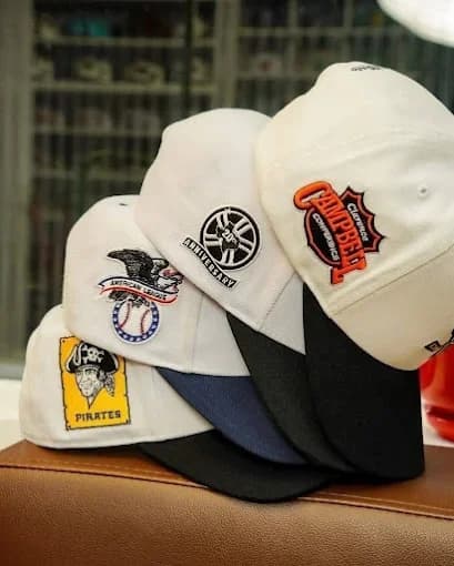 Custom 3D embroidered caps created by Inca Threads for a Sacramento-area performance auto brand.