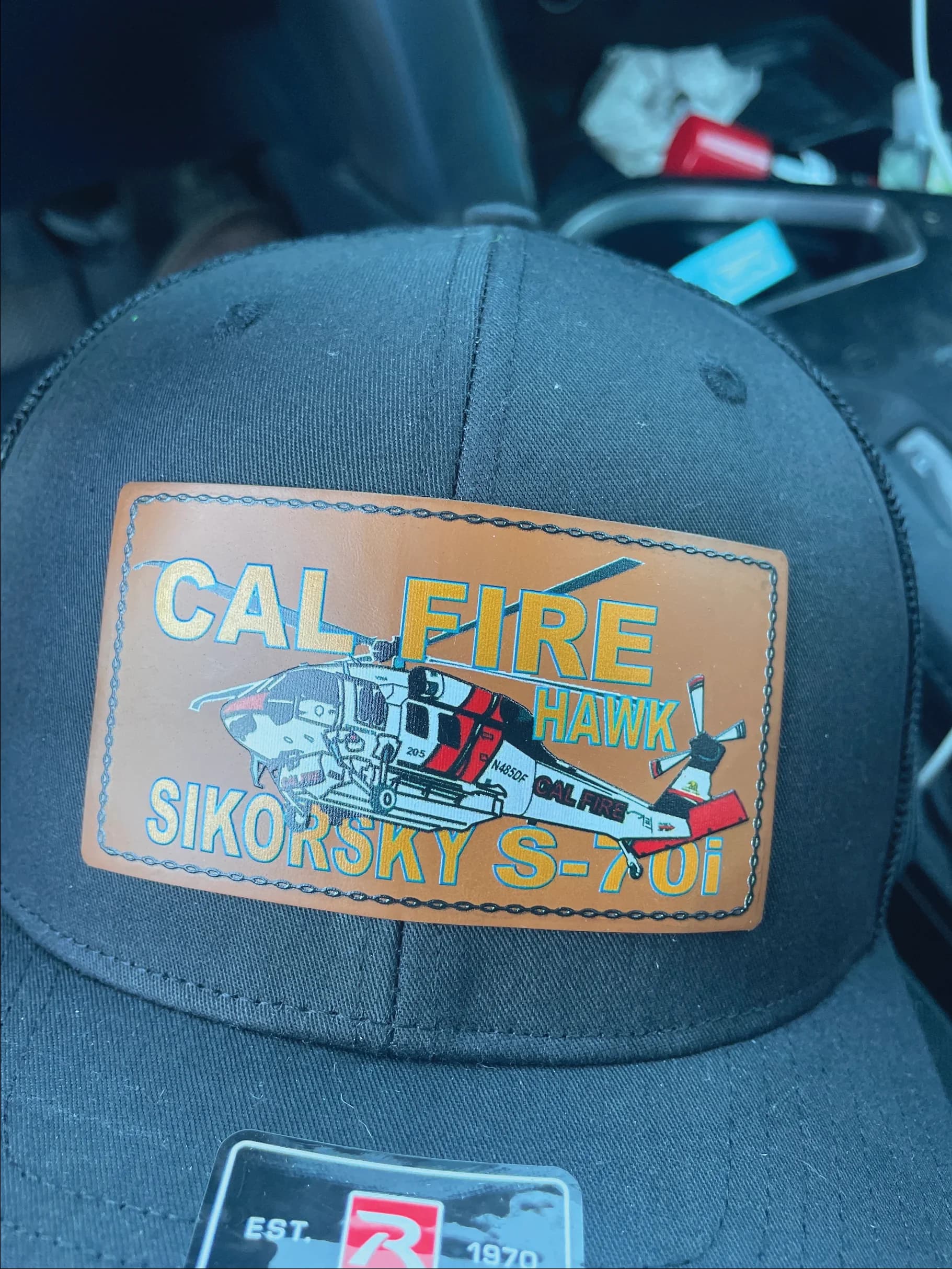 UV printed leather patch hat with fire and rescue agency logo, made by Inca Threads in Sacramento, California.