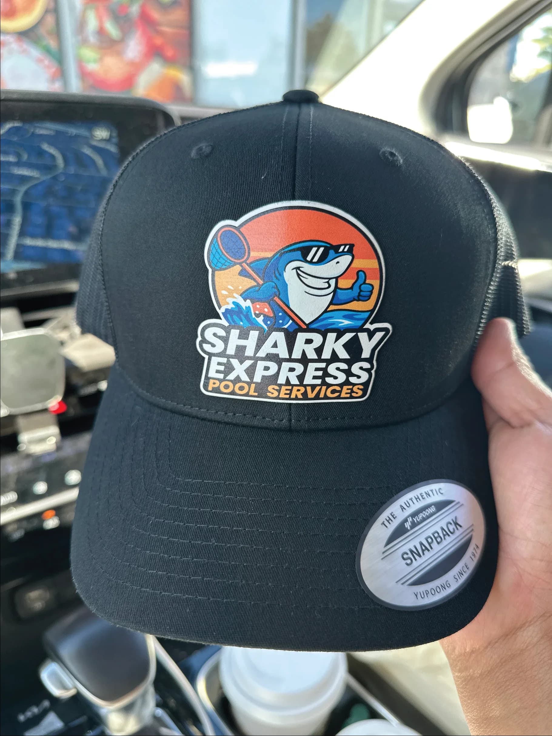UV printed leather patch hat with custom logo, produced by Inca Threads for a Sacramento pool service company.