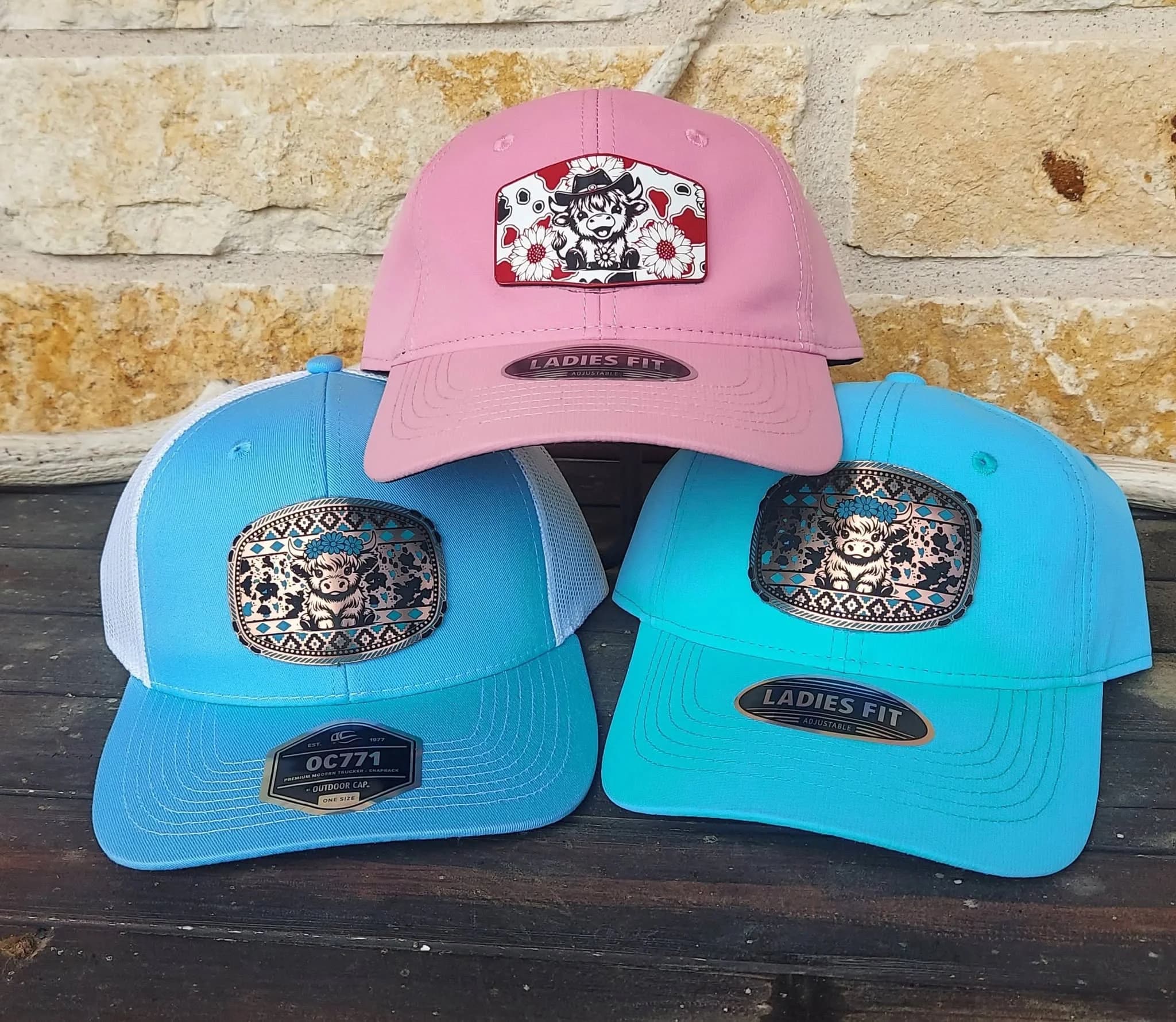 A pair of custom patch caps in coordinating colorways, produced by Inca Threads for a Sacramento customer.