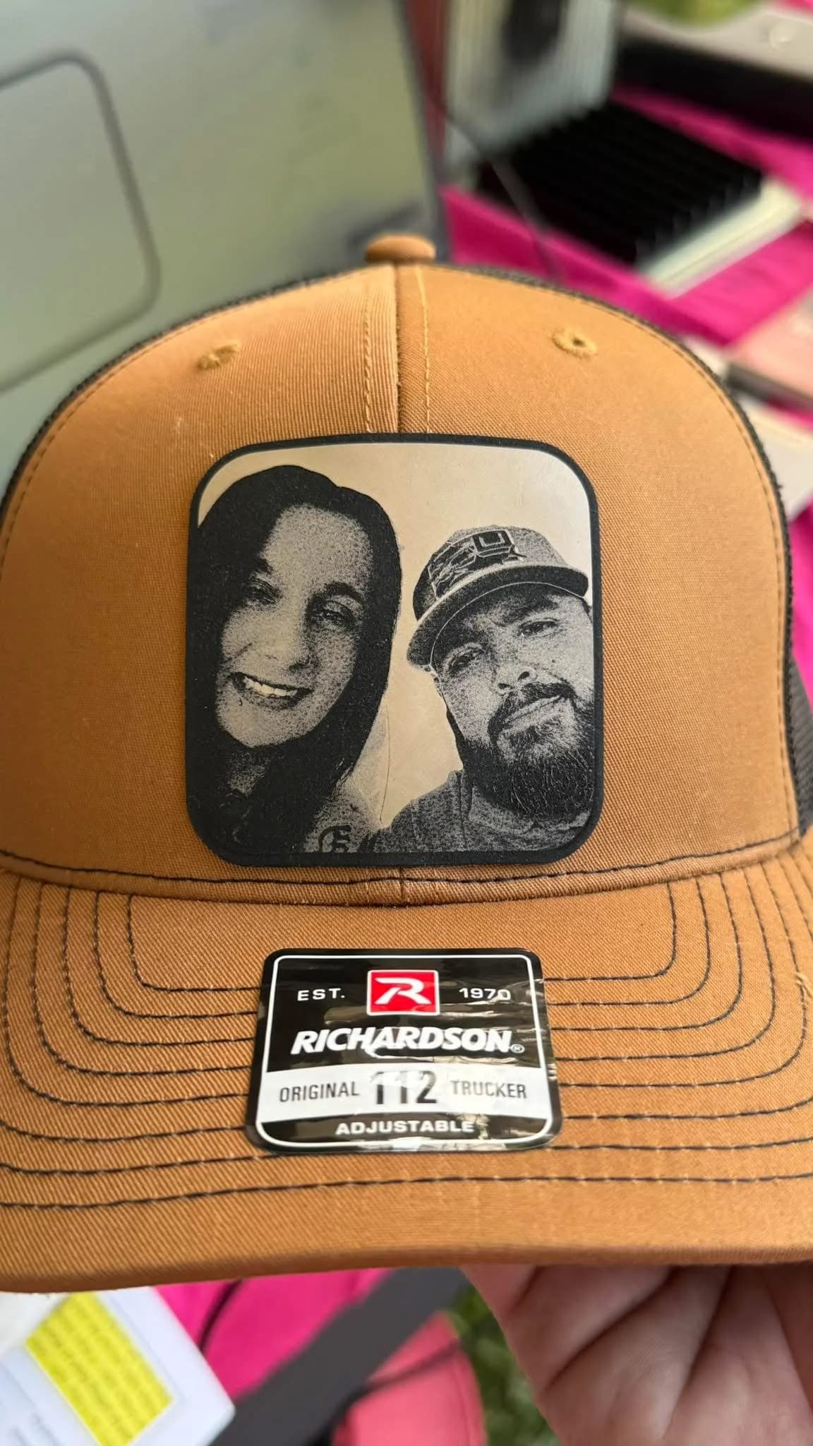 Custom sublimated patch hat with embroidered logo, produced by Inca Threads for a Sacramento business.