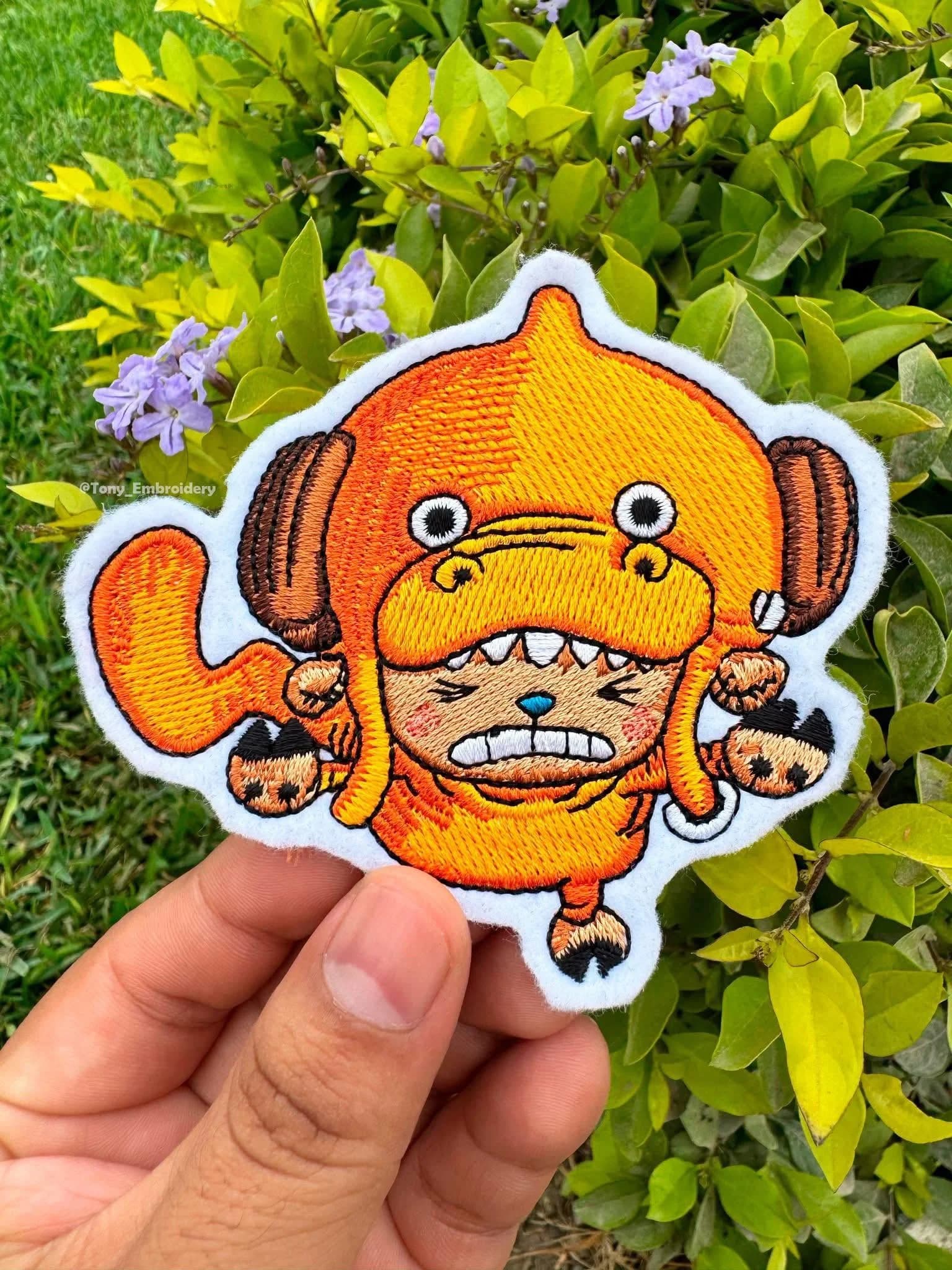 Custom embroidered patch with illustrated design, sewn and ready for apparel by Inca Threads in Sacramento.