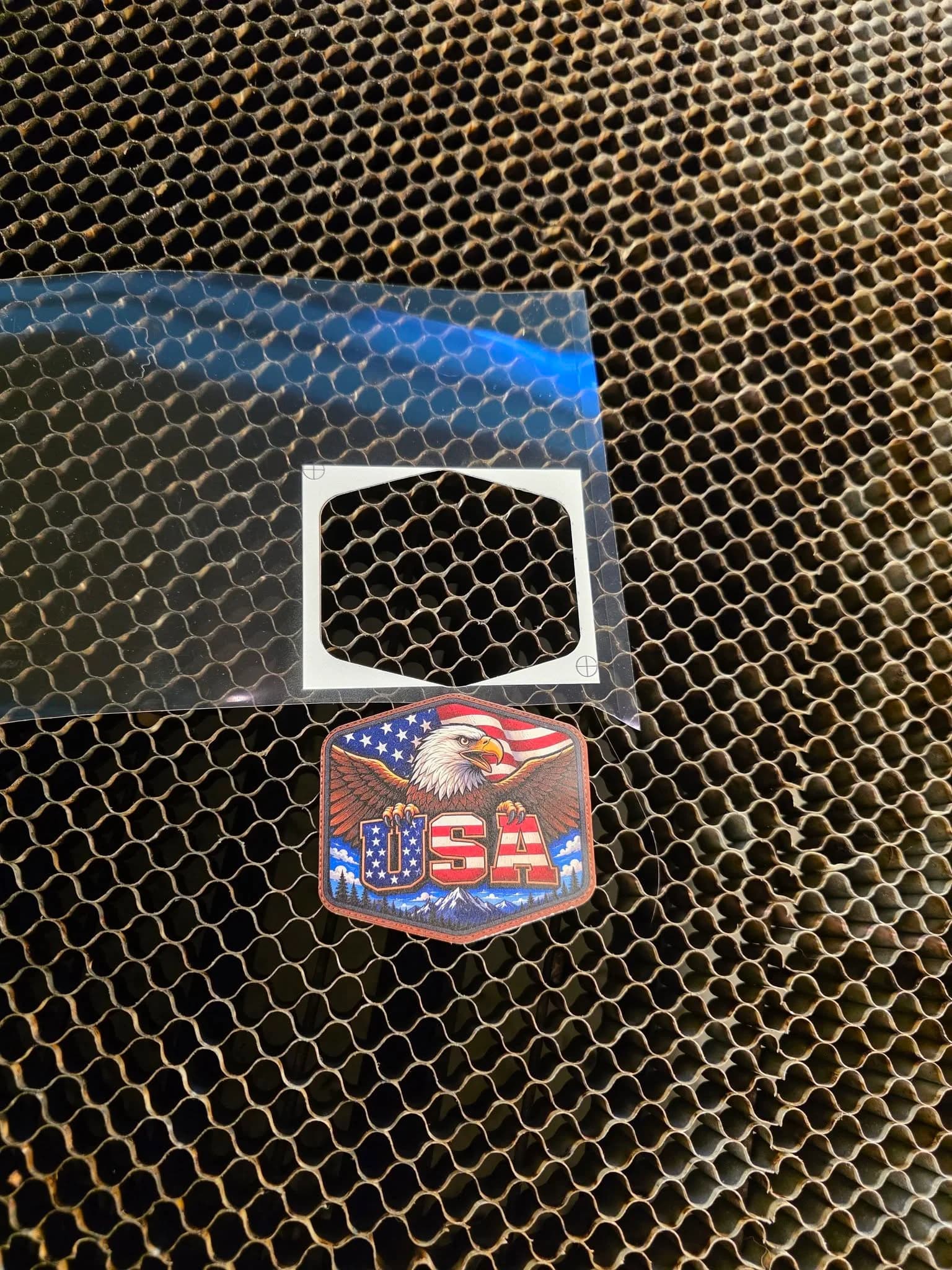 Custom engraved leather patch ready for heat-seal application, crafted by Inca Threads in Sacramento.