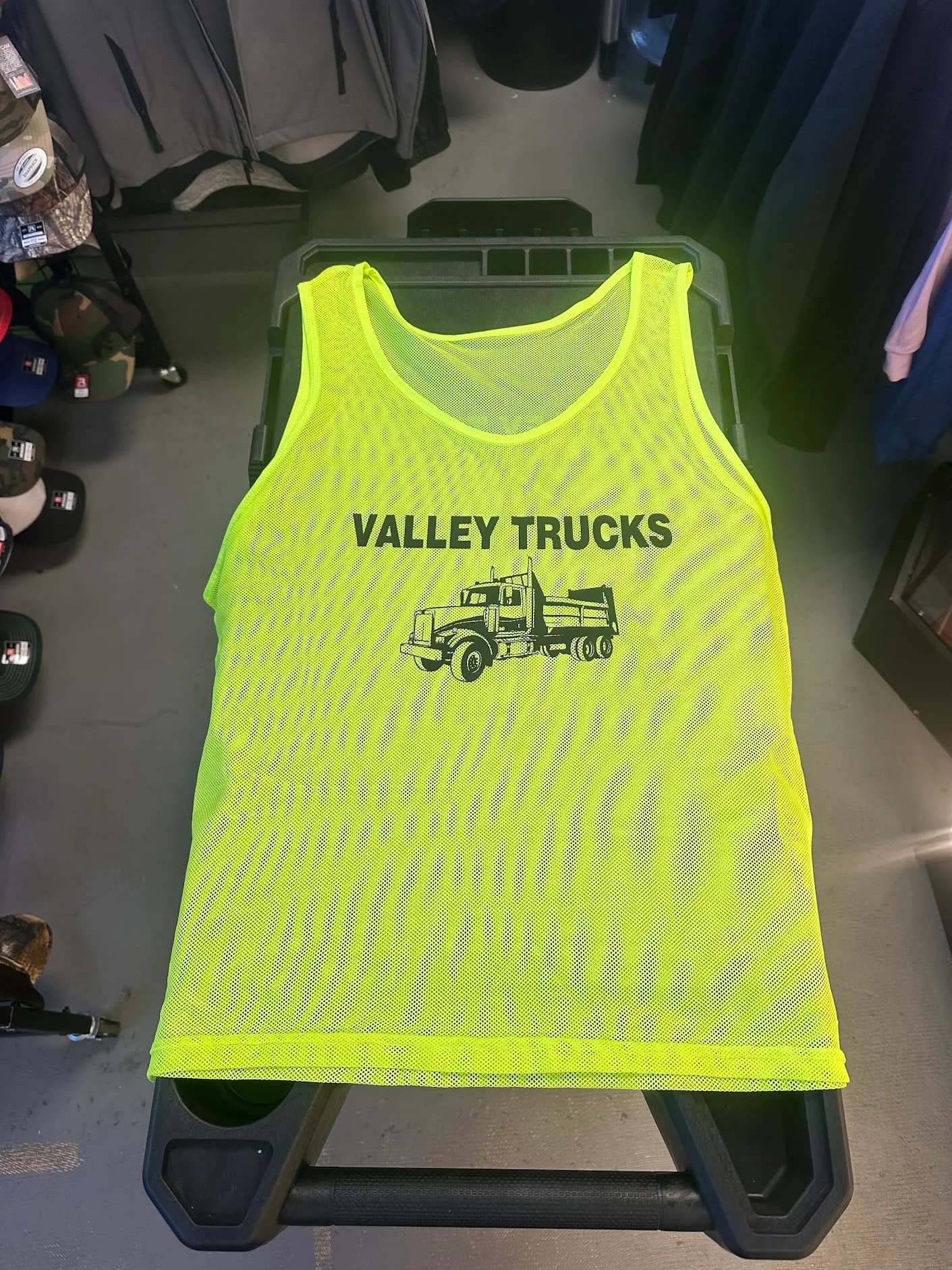 Full-color custom printed training vest produced by Inca Threads for a Sacramento trucking company.