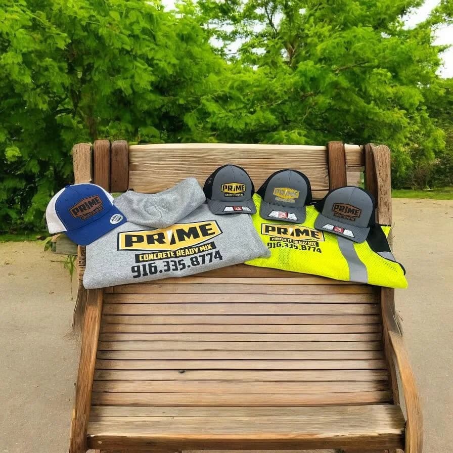 Printed shirts, hoodie, hats, and safety vest made by Inca Threads for a Sacramento concrete company.