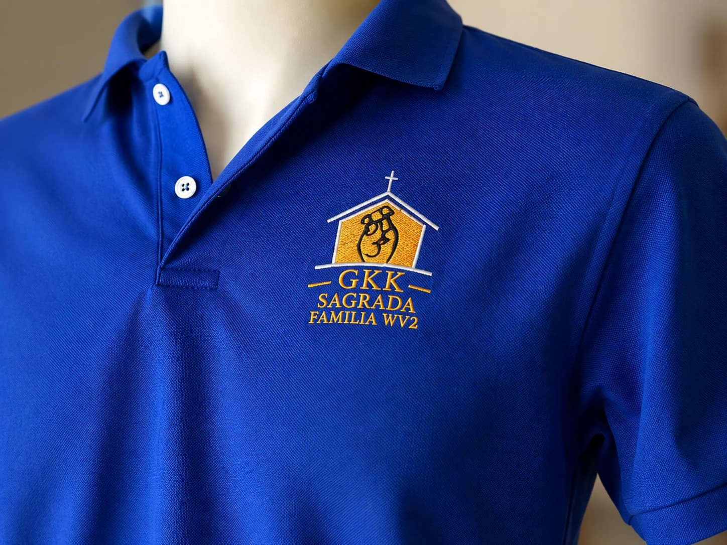 Custom embroidered polo shirt with a left-chest logo design, created by Inca Threads in Sacramento, California.