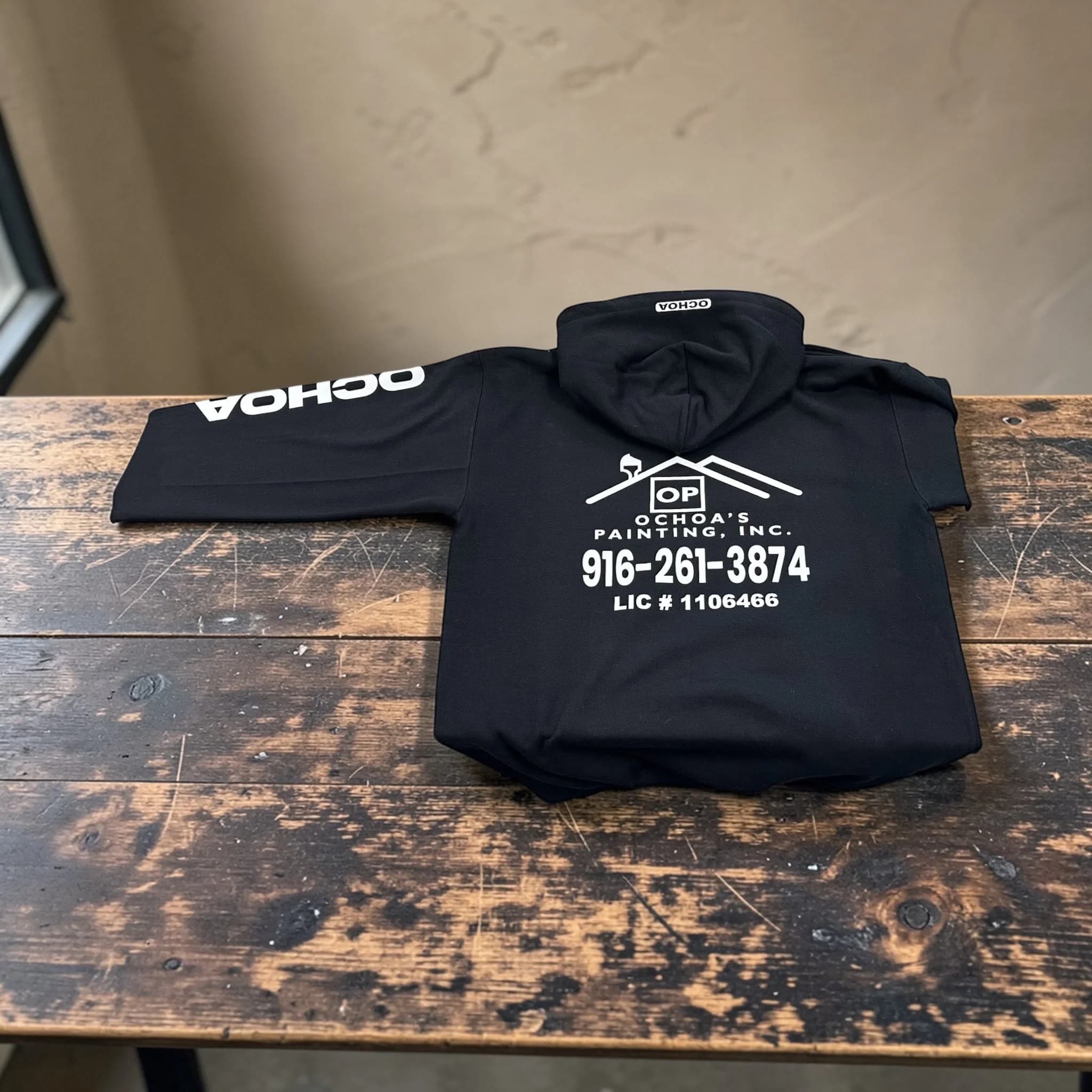 Ochoas Painting crew hoodie with custom DTF printed logo, produced by Inca Threads in Sacramento, California.