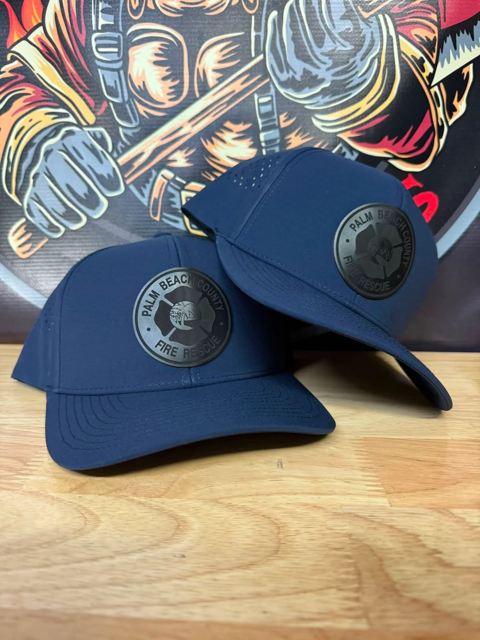 Palm Beach Fire Rescue PVC patch caps with custom department logo, produced by Inca Threads in Sacramento.