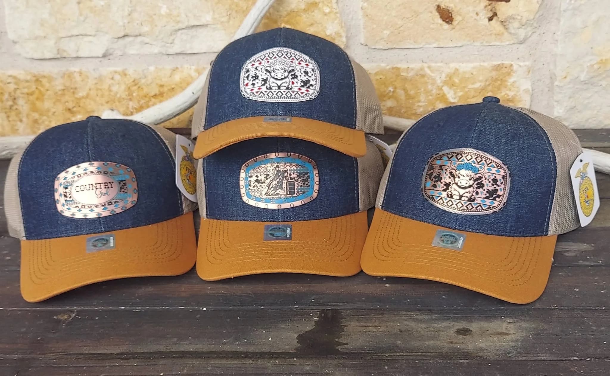 Western-style leather patch caps with custom designs, crafted by Inca Threads for a Sacramento-area customer.