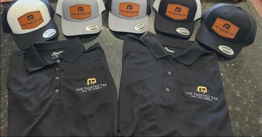 Custom embroidered polo shirt with left-chest logo design, made by Inca Threads for a Sacramento restaurant.