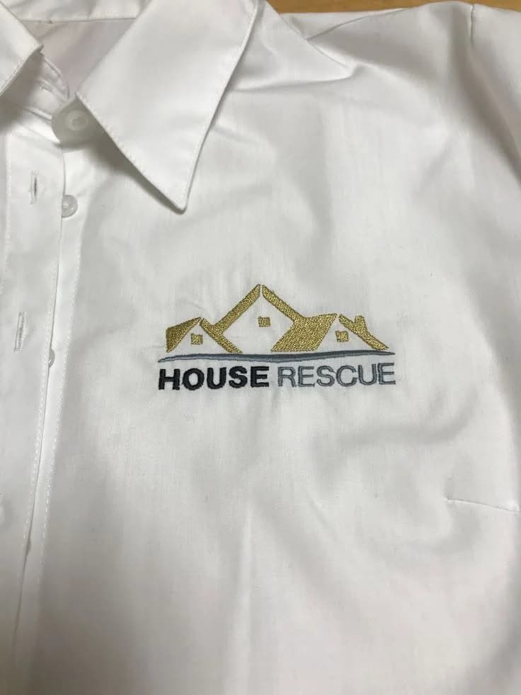 Custom embroidered dress shirt with professional logo, produced by Inca Threads for a Sacramento real estate company.