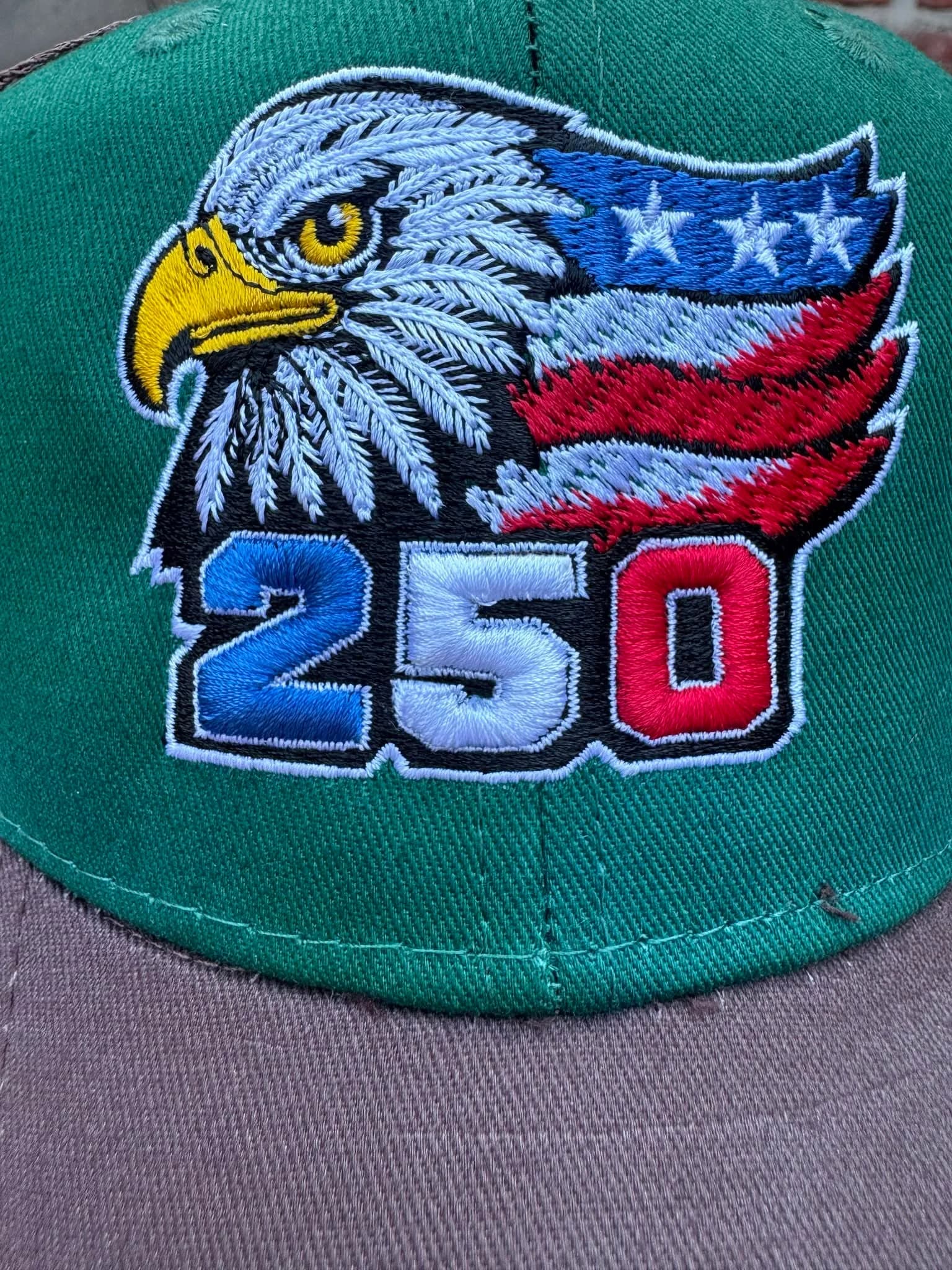 Custom embroidered hat featuring an eagle design, made by Inca Threads for a Sacramento community celebration.
