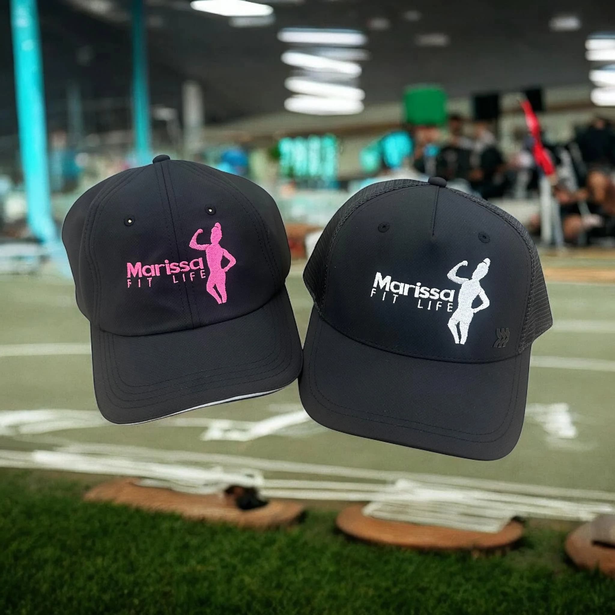 Custom embroidered cap with fitness brand logo, made by Inca Threads for a Sacramento fitness company.