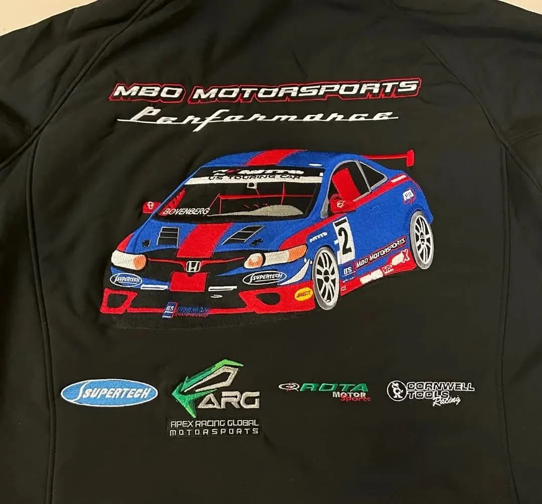 Racing team jacket with multi-logo embroidery, custom decorated by Inca Threads for a Sacramento motorsports team.